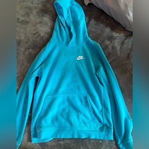 Light blue Nike hoodie with white logo